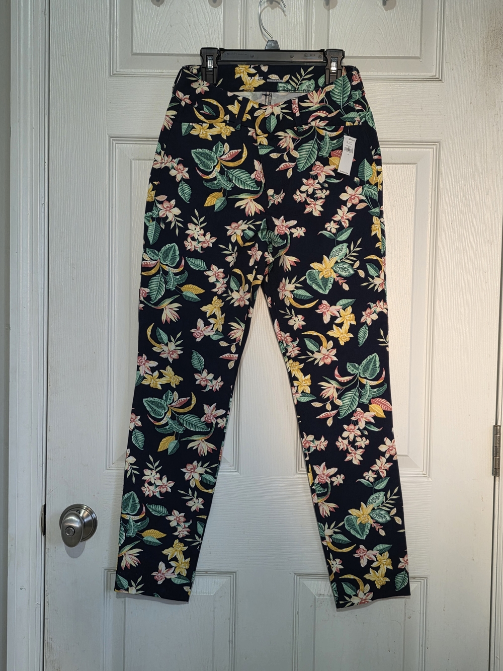 Old Navy Pixie High Rise Ankle Pants Floral Print- Navy Background.